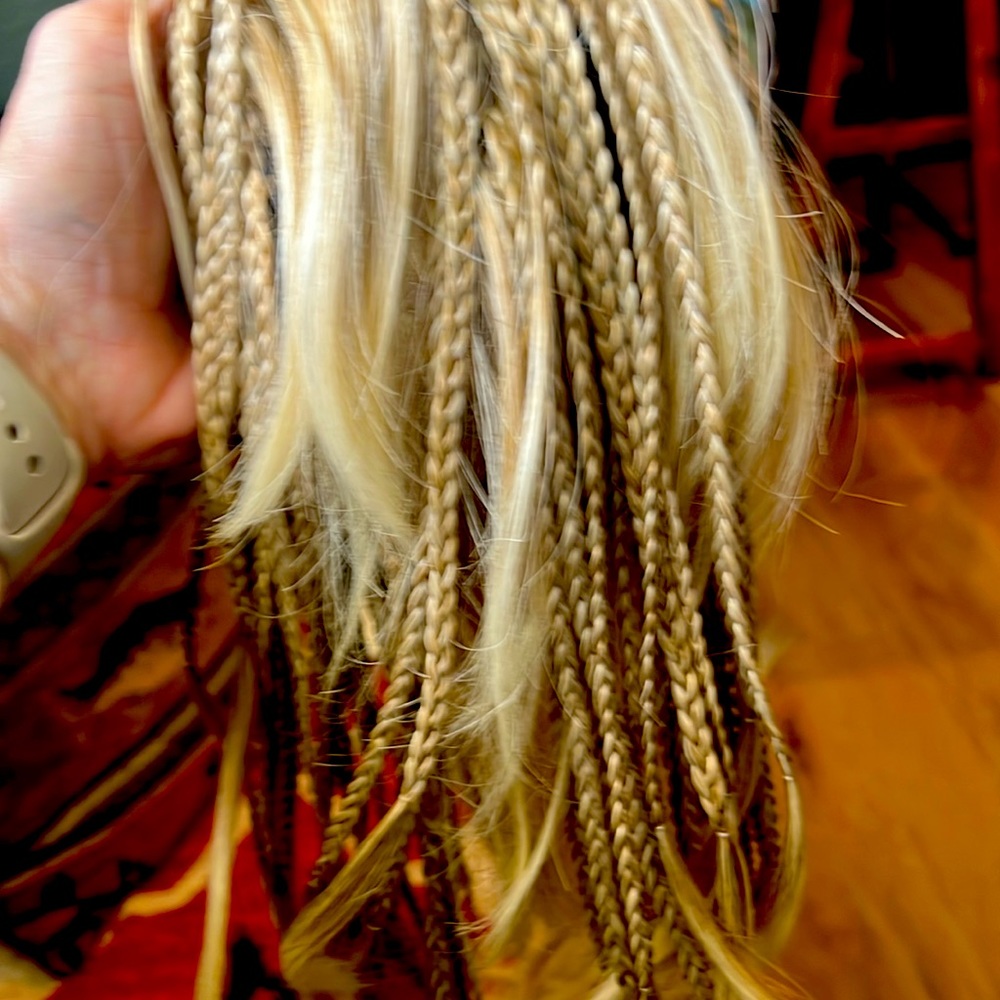 Hairpiece clips into hair as shown put your hair in a ponytail clip on blond